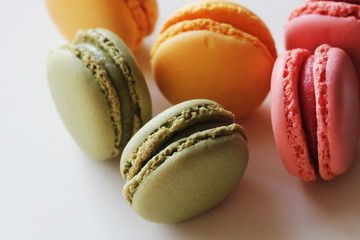 Traditional colorful french macarons are sweet meringue-based confection