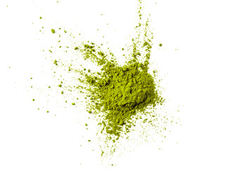 Green matcha tea powder on white background. Powdered maccha tea explosion, isolated on white with clipping path. Top view or flat lay.