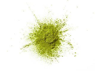 Green matcha tea powder on white background. Powdered maccha tea explosion, isolated on white with...