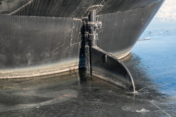 ship rudder in ice at winter