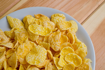 Glazed cornflakes. Breakfast cereals. Background for healthy eating and vegetarianism.