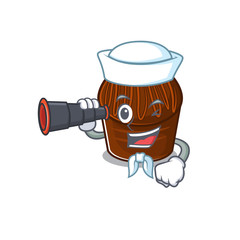 A picture of chocolate candy working as a Sailor with binocular