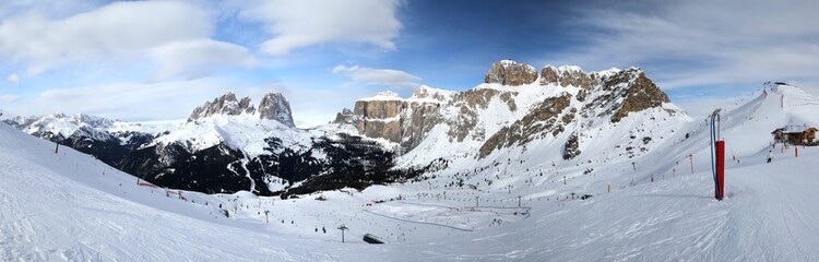 Panoramic winter view of Alpine mountains. Sella Ronda. Val di Fassa. Italy.