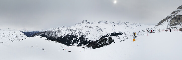 Fototapeta na wymiar Panoramic winter view of Alpine mountains. Dolimites. Sella Ronda. Alta Badia. South Tirol. Italy.