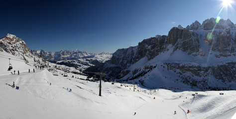 Panoramic winter view of Alpine mountains. Sella Ronda. Val di Fassa. Italy.