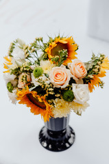 flower arrangement in a black vase