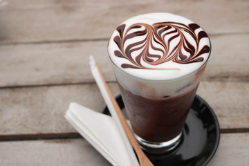 Iced mocha coffee. espresso coffee mixed chocolate put in ice in long glass. Make-up beautiful art...
