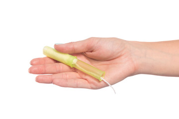 female hand isolated on white background holding tampon - female care - Image