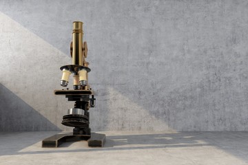 old retro microscope illuminated by ray of light