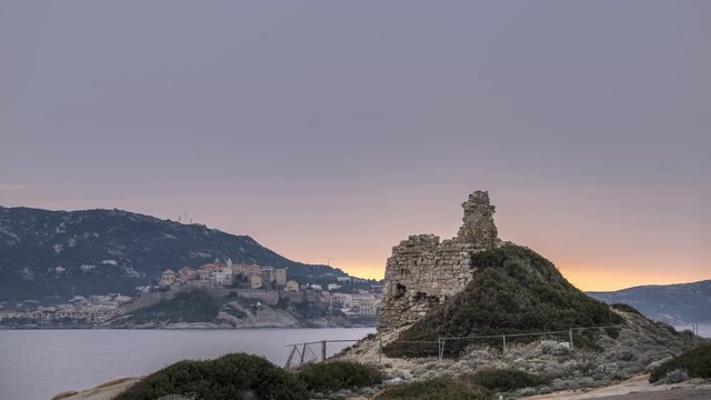 Time-lapse of sun setting behind Calvi citadel from Punta Caldanu in the Balagne region of Corsica