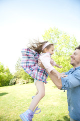 Obraz premium Happy family. Father with child in a park.