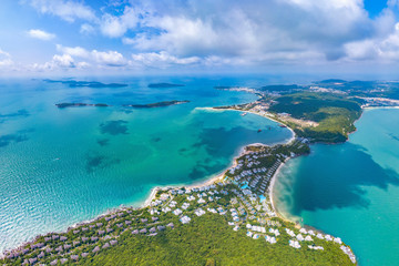Fototapeta na wymiar Coastal Resort Scenery of Ong Doi Cape, Emerald Bay, Phu Quoc Island, Vietnam, a Tourism Destination for Summer Vacation in Southeast Asia, with Tropical Climate and Beautiful Landscape. Aerial View.