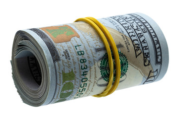 100 dollars rolled into a roll isolated on white background. concept wealth, criminal money,...