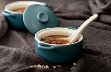 Bean soup bowls on a grey cloth