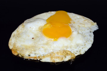 egg isolated on black background