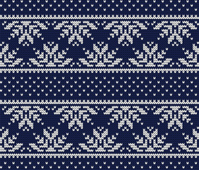 Knitted winter seamless pattern snowflakes..