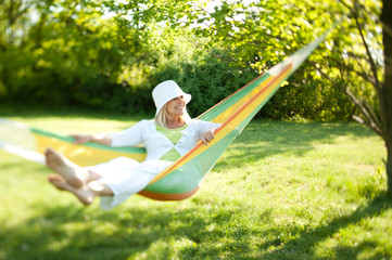 Happy senior woman in a park