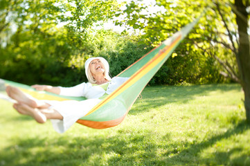 Happy senior woman in a park