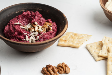 Beetroot hummus with walnuts sunflower seeds
