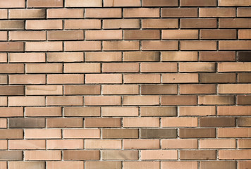 Pale brown wall bricks background texture