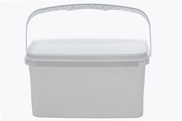 White plastic bucket with handle up on white background. Isolated