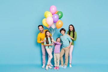 Full length body size view of nice attractive lovely charming cheerful cheery big full family celebrating occasion festal decoration isolated on bright vivid shine vibrant blue color background