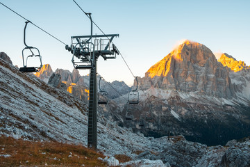Ski lifts along the ski slope near the Cinque Torri mountains the background Tofane mountain near...