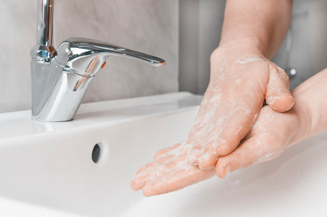 Effective handwashing tecniques: palm to palm. Hand washing is very important to avoid the risk of contagion from coronavirus and bacteria.