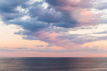 Naklejka na ściany i meble Morning landscape photo with colorful clouds