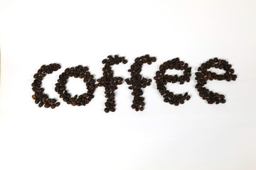 The coffee beans are arranged in alphabetical order and the coffee powder is on a white background.