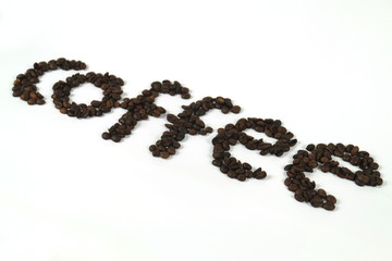 The coffee beans are arranged in alphabetical order and the coffee powder is on a white background.