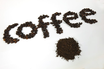 The coffee beans are arranged in alphabetical order and the coffee powder is on a white background.