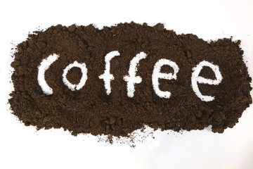 The coffee beans are arranged in alphabetical order and the coffee powder is on a white background.