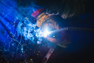 Man welder at work.