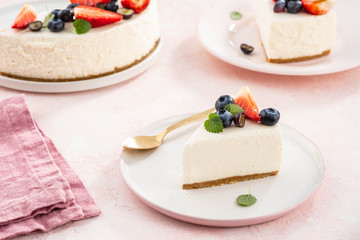 Slice of New York Cheesecake with berries.