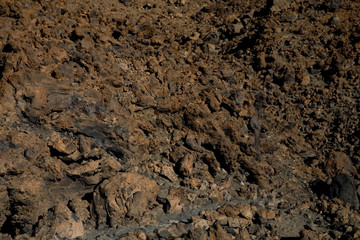 original brown natural background of volcanic congealed lava in close-up