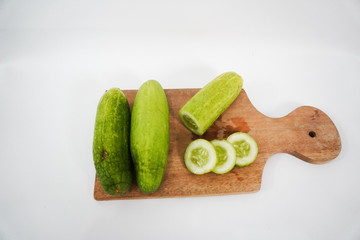 fresh cucumber cut on a tray