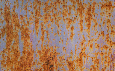 Background in grunge style. Old metal surface with traces of peeling paint and rust