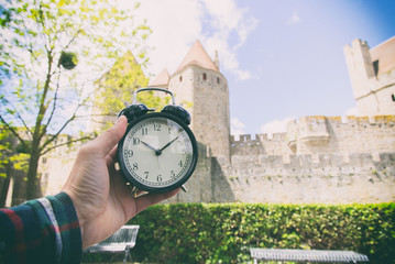 Alarm clock and old city