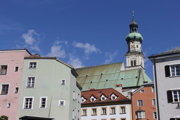 Fototapeta premium Urban European landscape with colored houses and church. Hall. Tirol. Austria