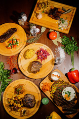 Many different delicious dishes on the table. Various snacks and antipasti on the table. Restaurant menu.Top view