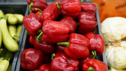 Bulgarian sweet red pepper on counter in market