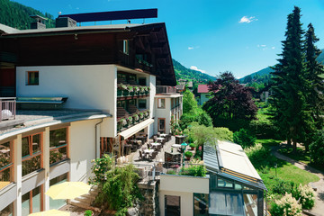 Fototapeta na wymiar Street restaurant with tables and chairs Bad Kleinkirchheim of Austria