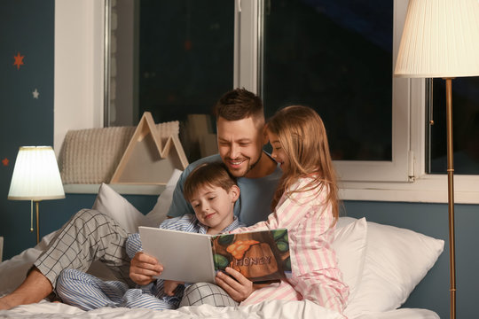 dad reading bedtime story