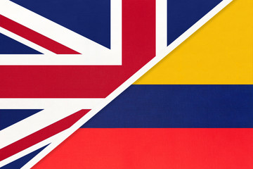 United Kingdom vs Colombia national flag from textile. Relationship between two european and american countries.
