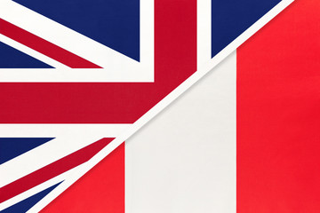 United Kingdom vs Peru national flag from textile. Relationship between two european and american countries.