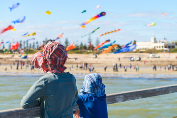 Children watching kites from Semaphore Jetty