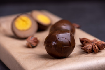 spiced corned egg in dark background