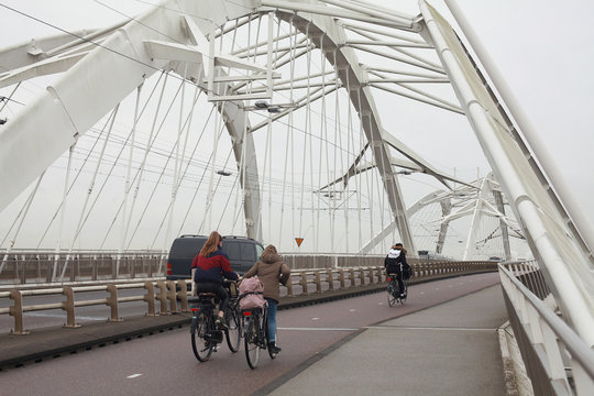 Amsterdam, Ijburg / Netherlands  - February 28 2020: Enneus Heermabrug Bridge connecting Ijburg with Amsterdam