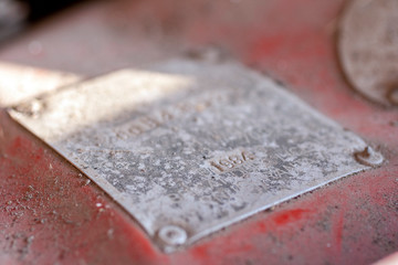 Metal plate on an old car